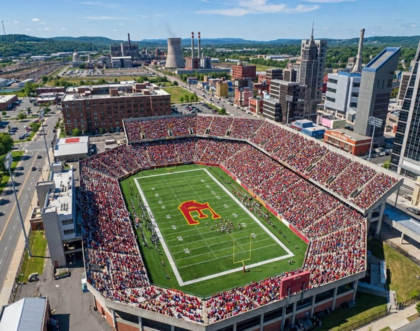 Aerial view of the Ellisburg football stadium and surrounding city